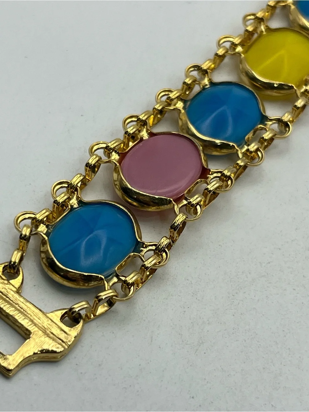 Pale Pink, blue, yellow oval cabochon gold tone vintage chain bracelet